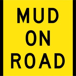Mud on Road Sign
